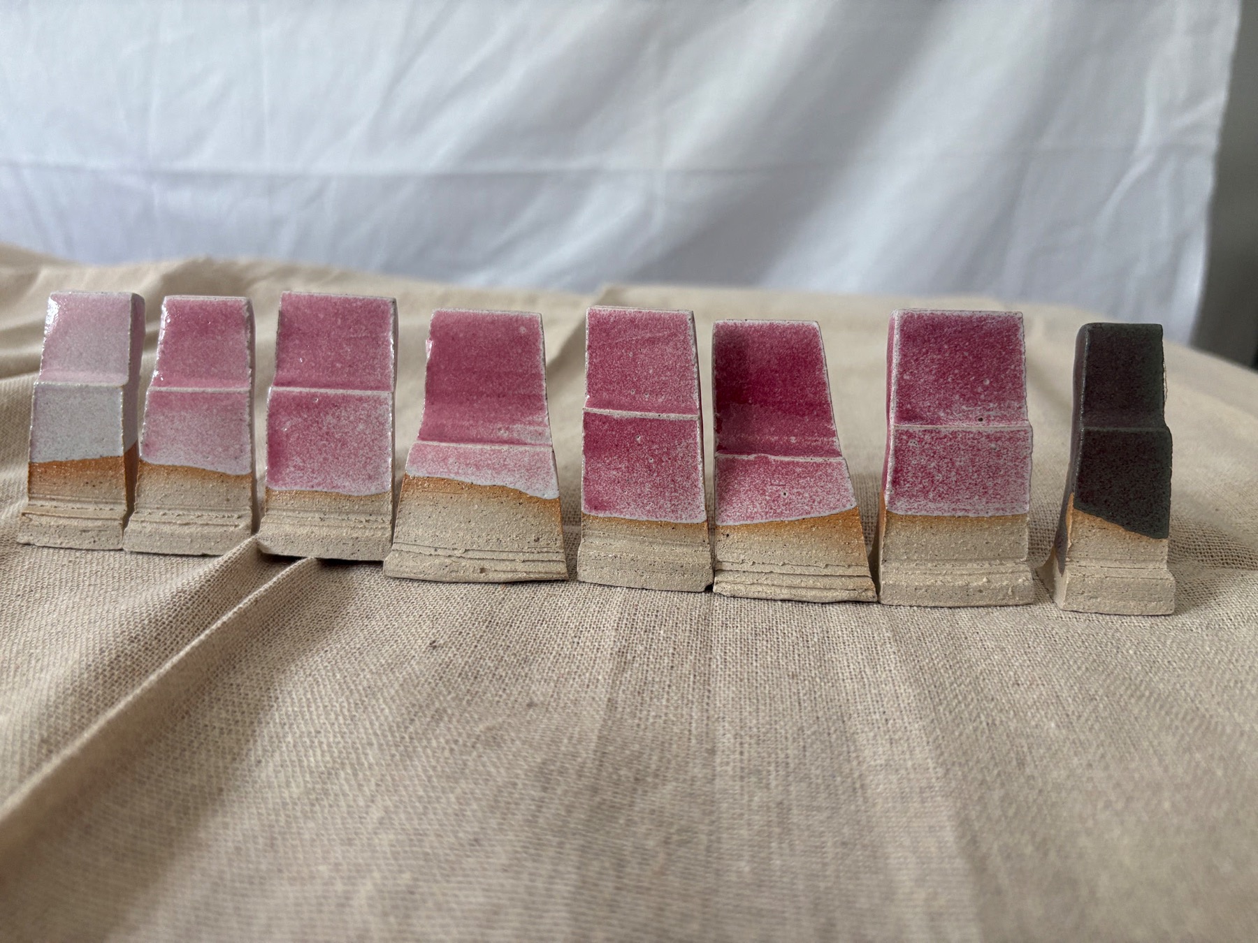 Full line of pink chrome-tin glaze test tiles