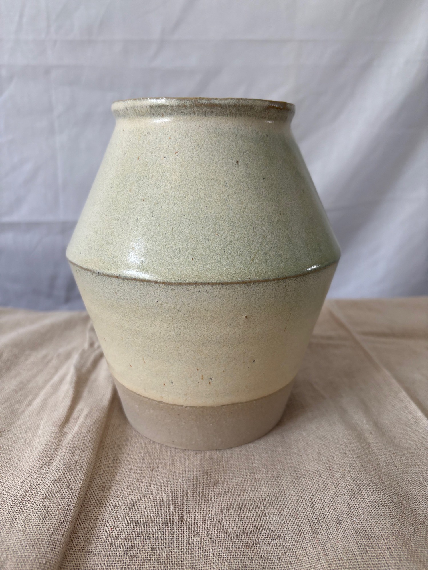 White stoneware vase with soft speckled glaze